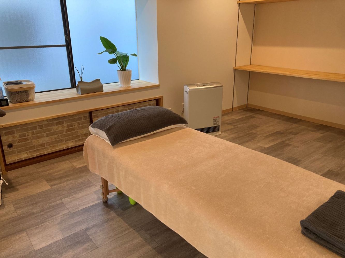 手技整体の施術シーン(肩・背中のケア)